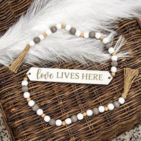 Love Lives Here Beaded Banner - The Fox Decor
