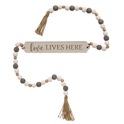Love Lives Here Beaded Banner - The Fox Decor